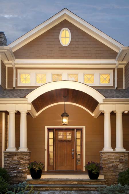 Home with Clopay Craftsman Collection fiberglass entry door.