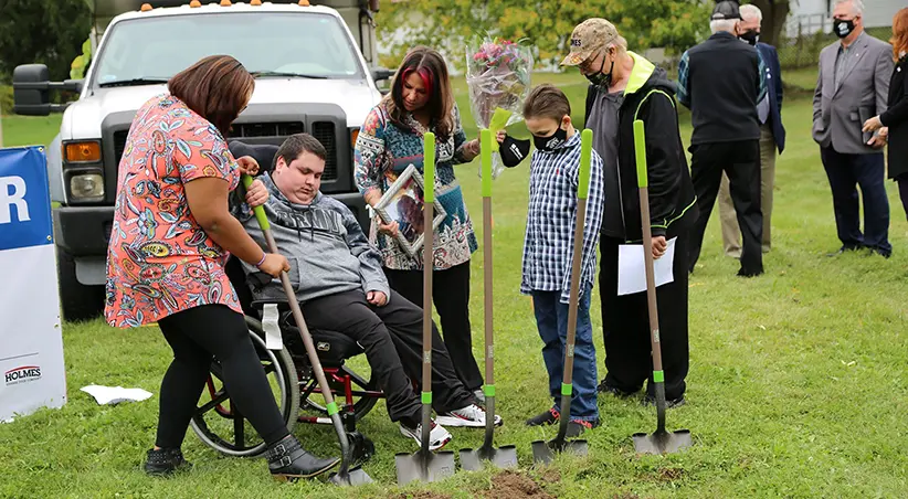 Family Digging with Shovels