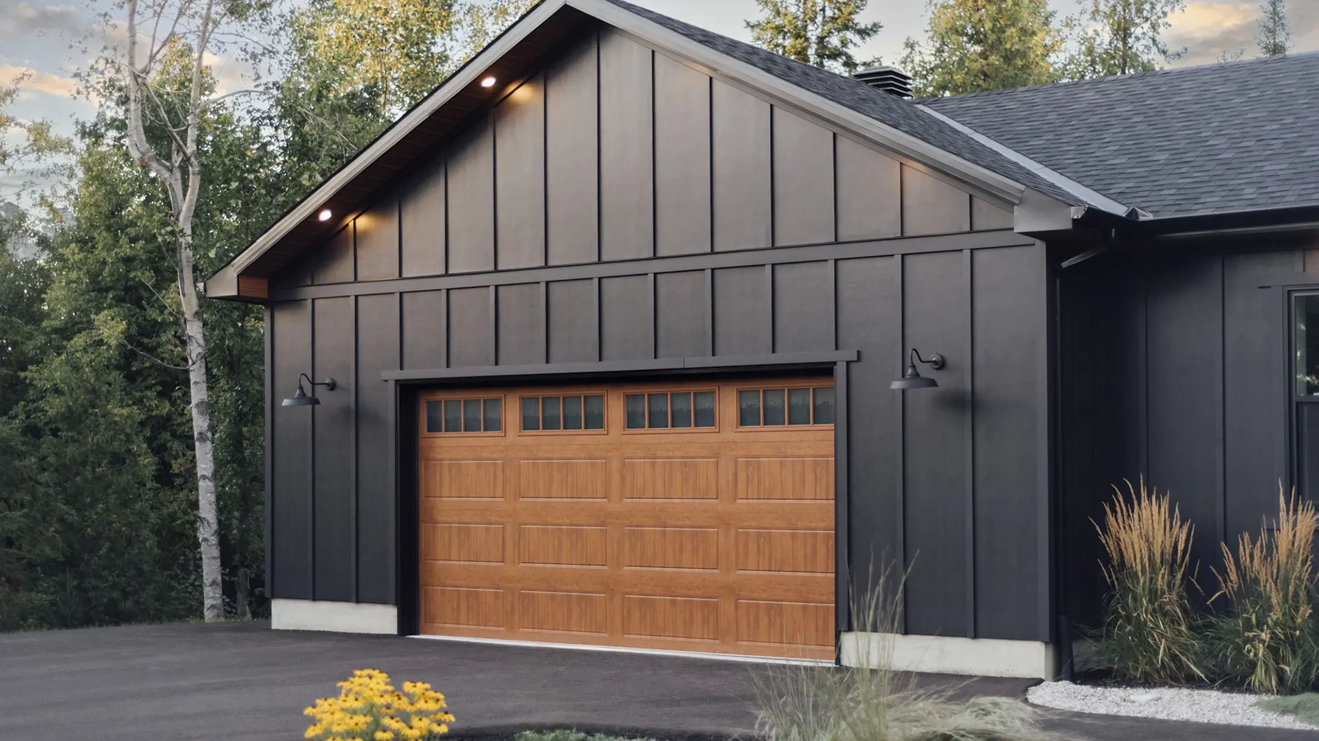 Gallery® Steel garage door with long panels and REC14 windows in Ultra-Grain® Oak Medium Finish