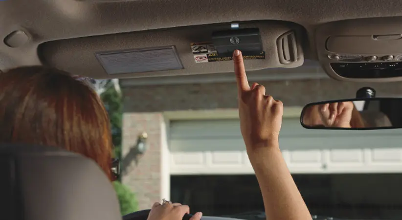 opening-garage-door-from-car Garage Door Spring Repair