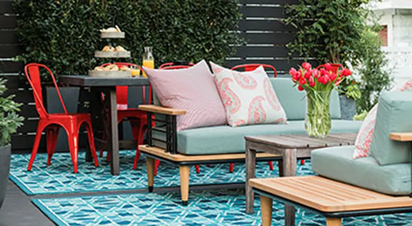 Urban Oasis 2018 home backyard couches and dining area