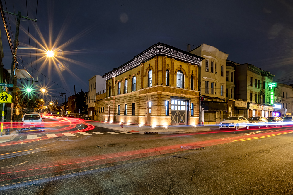 nighttime shot with traffic of Anthony Carrino firehouse renovation