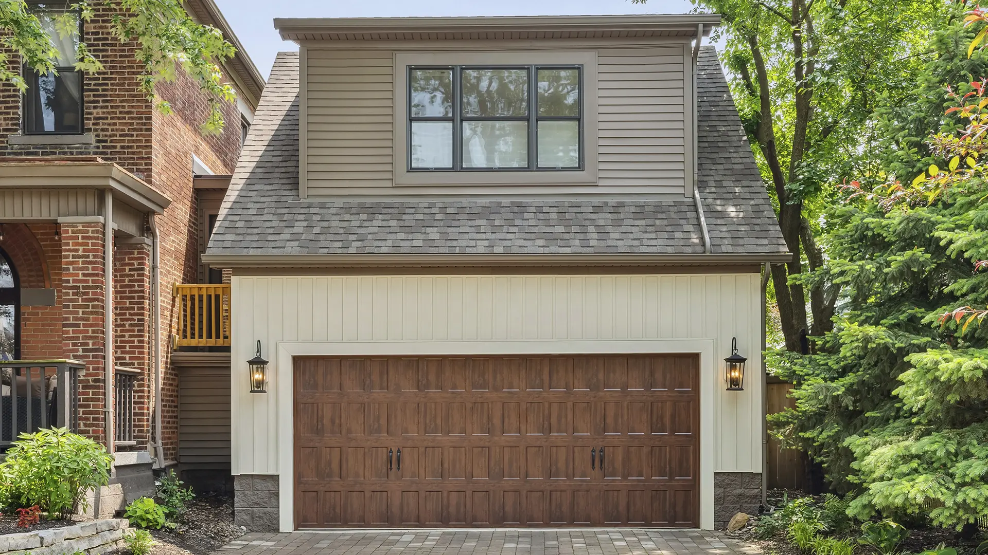 Bridgeport™ Steel garage door with narrow recessed panels in Ultra-Grain® Dark Finish