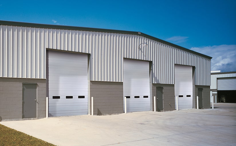 Industrial Series | Deep Ribbed Steel commercial garage door Model 520 in White