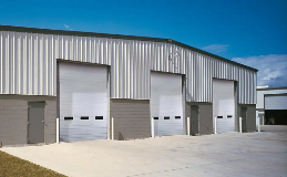 Industrial Series | Deep Ribbed Steel commercial garage door Model 520 in White