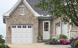 Steel Entry Door in White with Prairie Windows and coordinating Classic Steel white garage door