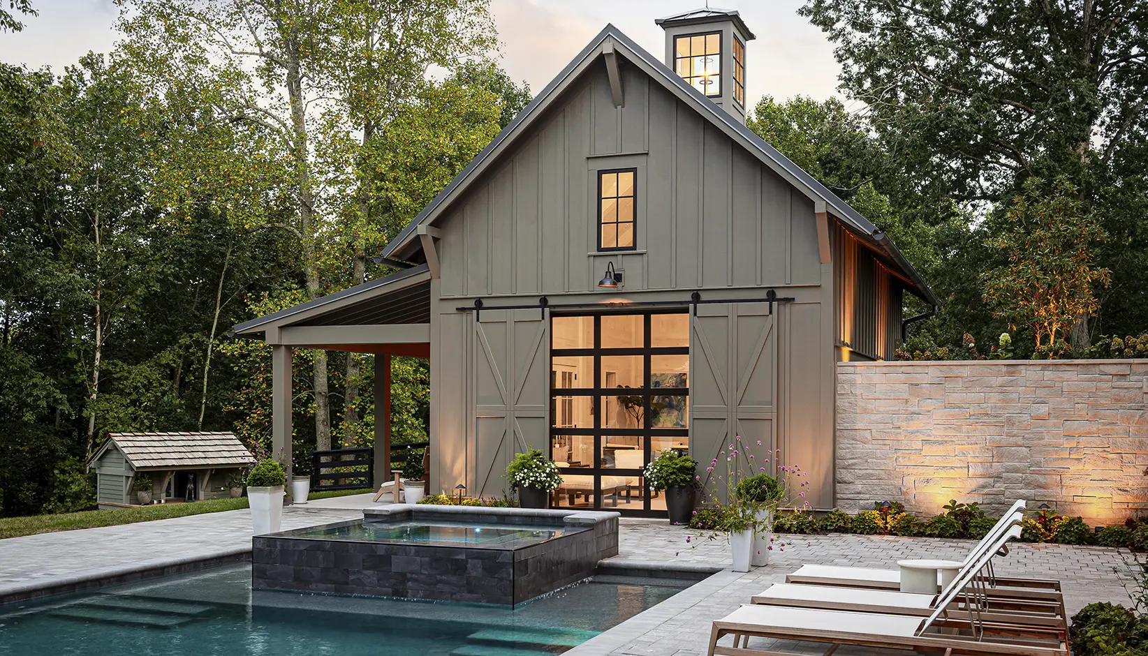 Avante® alumnium and glass garage door in bronze anodized frame with clear tempered insulated glass