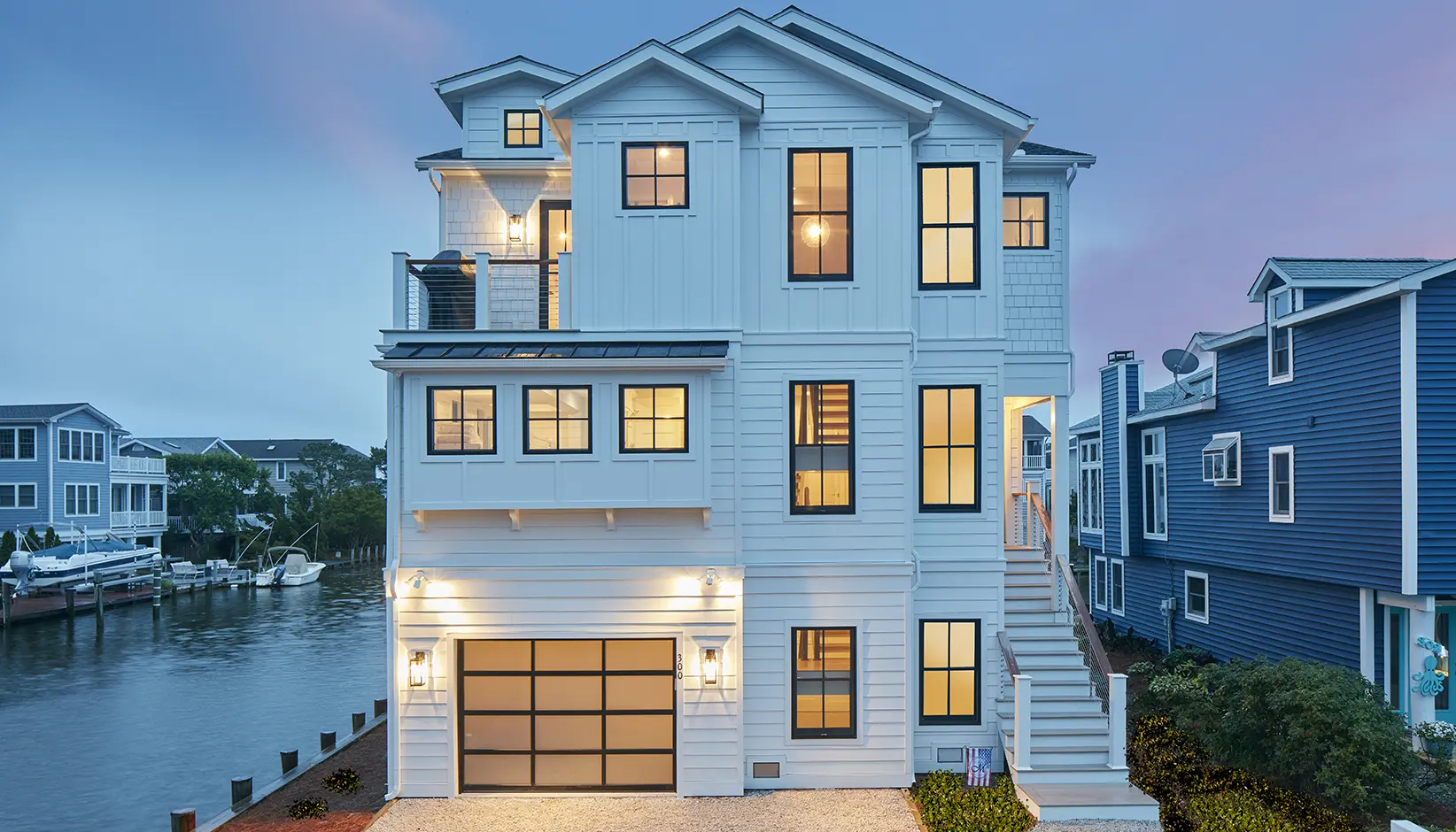 Avante glass garage door on coastal home