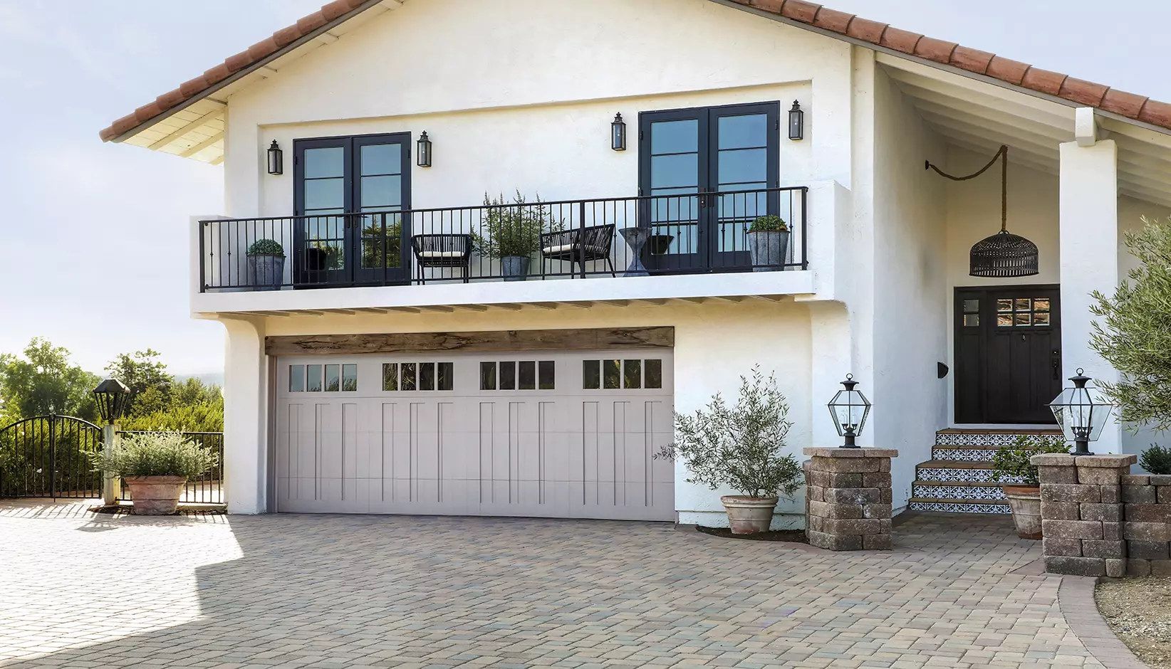 Canyon Ridge 5-Layer garage door in Design 13 with REC 14 windows in custom color