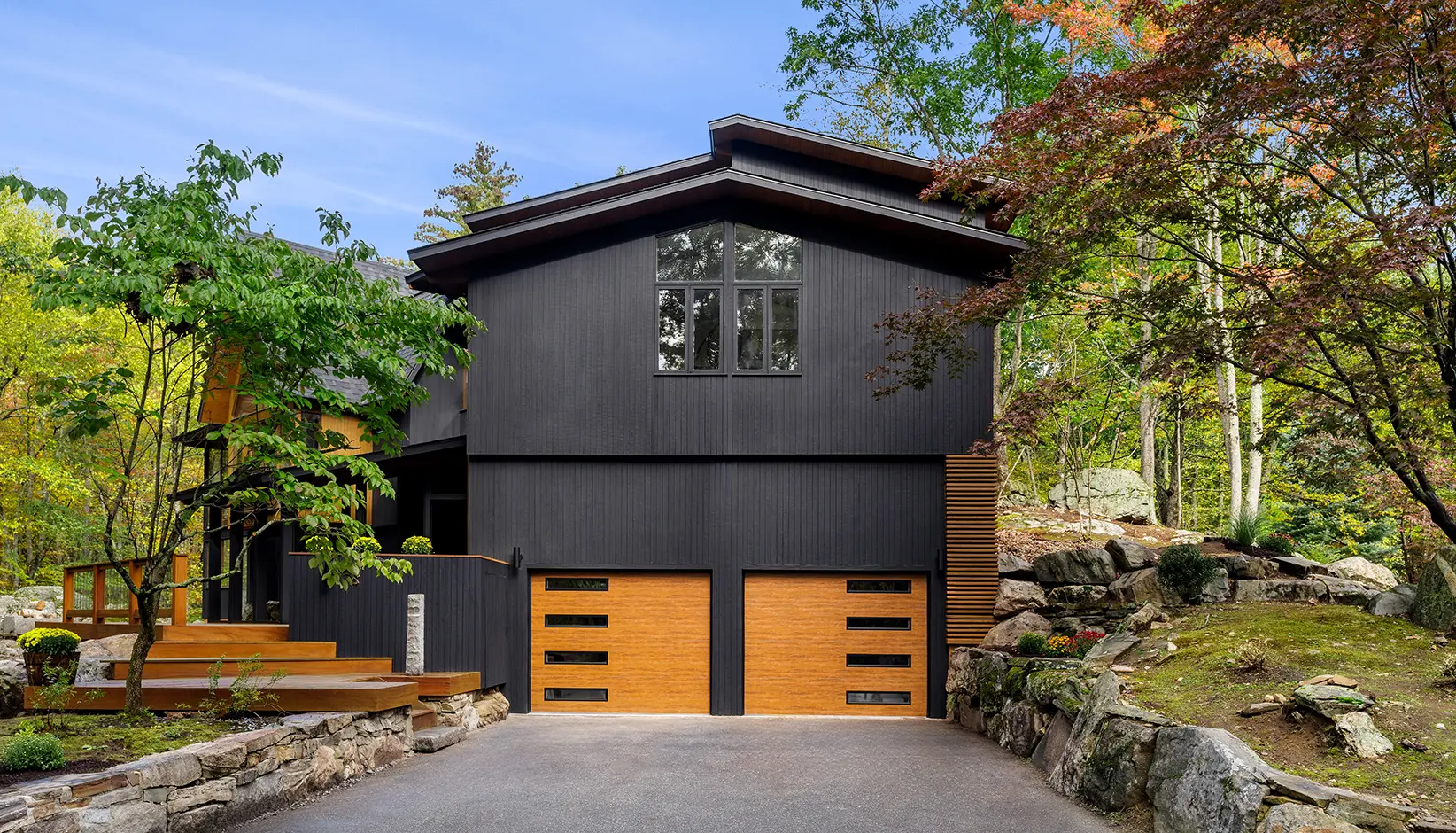 ModernSteel-MediumUG-SlimBlk Modern Steel garage door in Ultra-Grain Medium Finish with contemporary slim windows in black